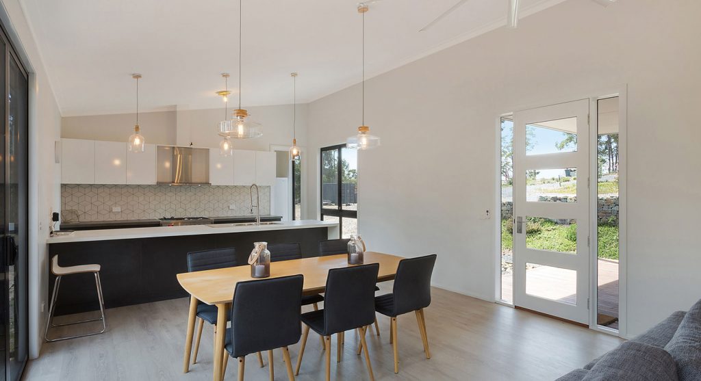Anchor Homes: Kitchen and dining area of a recently completed project in Eden, NSW.
