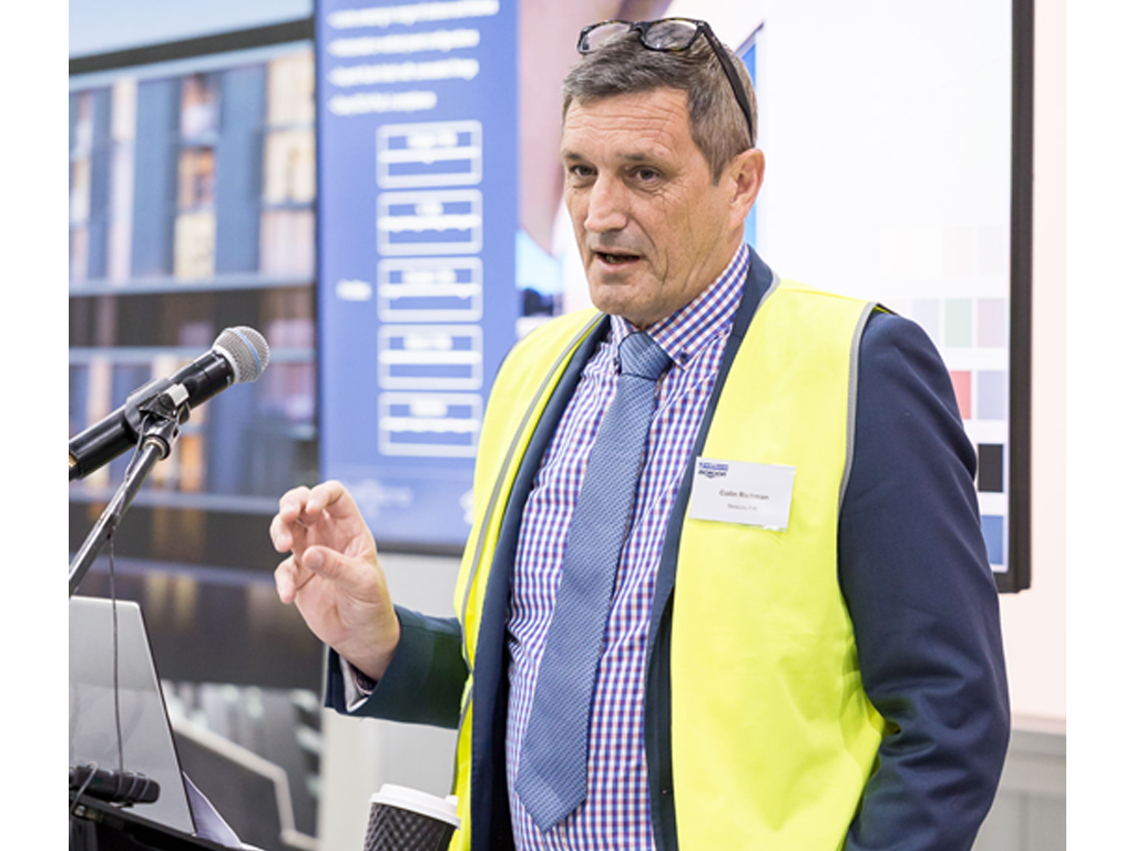 Metecno PIR General Manager Colin Richman (pictured at microphone) confirmed the factory will produce the firm’s lightweight, thermally efficient and fire retardant panels.