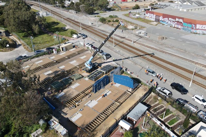 Closed wall panels by OFFISTE being lifted into position for Blakeley’s My Home project.