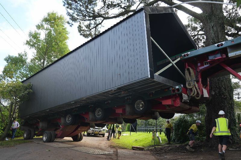 A hydraulic trailer was used to lift the modules for Wild Modular’s Osborn House project.